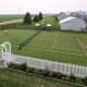 The All Iowa Lawn Tennis Club is a "whimsical replica" of Wimbledon, as the court's creator puts it. 